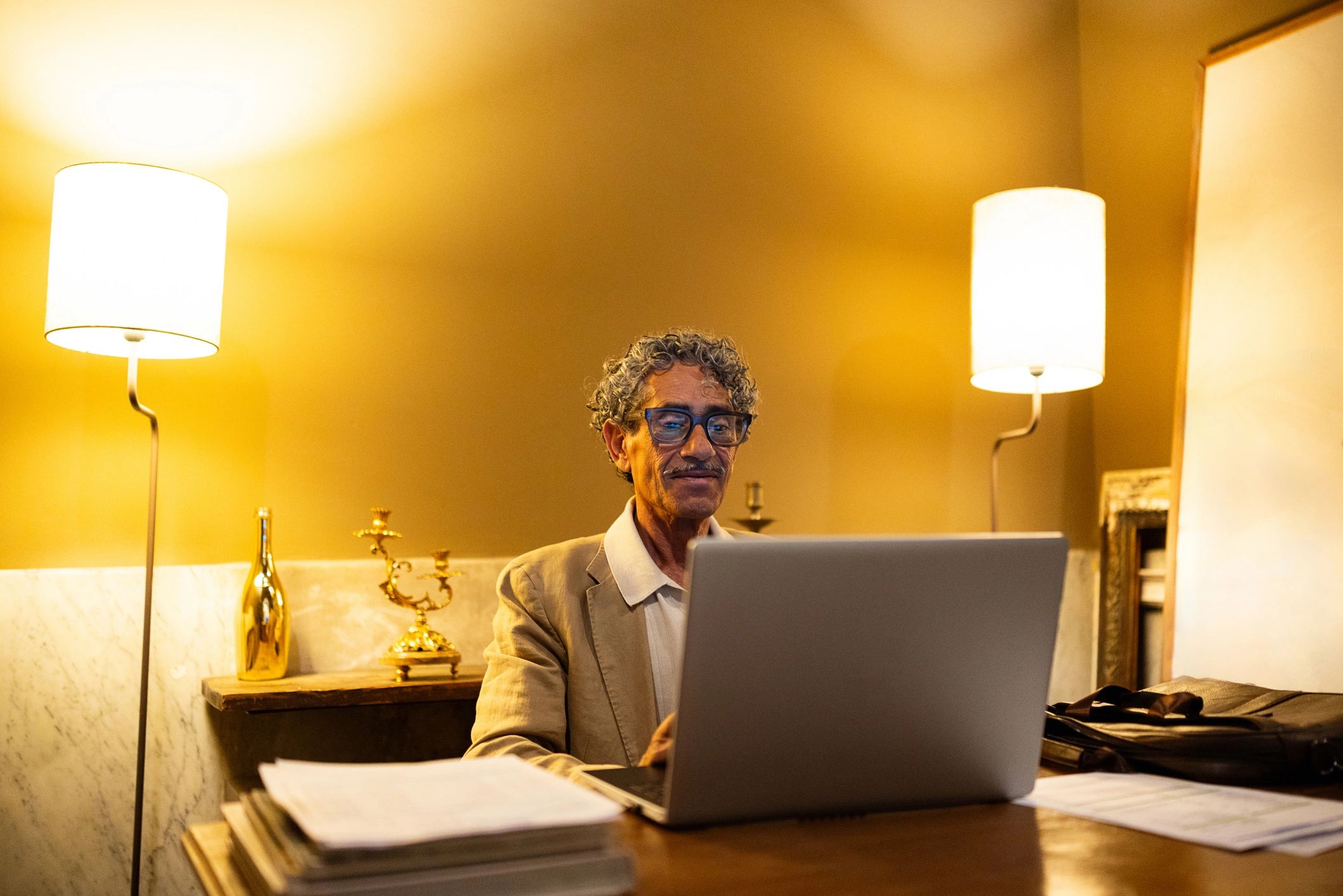 Professional consultant working on a laptop at a desk